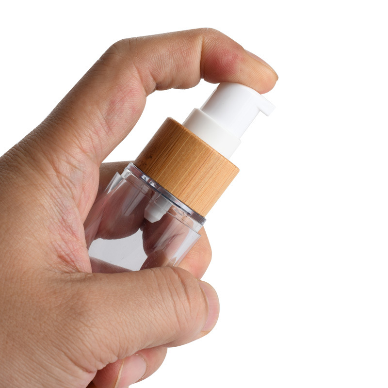 Recyklovateľné mlieko 50 ml Bambusová bezvzduchová fľaša Pre kozmetickú bambusovú fľašu s pumpičkou Recyklovateľné mlieko 50 ml Bambusová bezvzduchová fľaša Pre kozmetickú bambusovú fľašu s pumpičkou