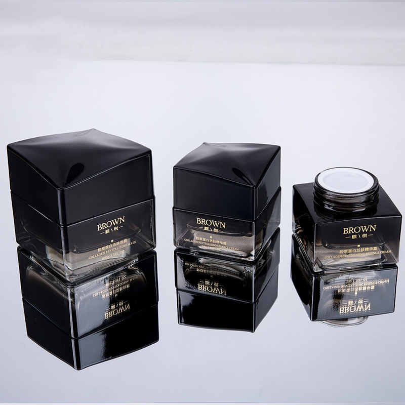 Jedinečná štvorcová sklenená nádoba na krém s dizajnom vyvýšeného veka na kozmetické balenie Jedinečná štvorcová sklenená nádoba na krém s dizajnom vyvýšeného veka na kozmetické balenie