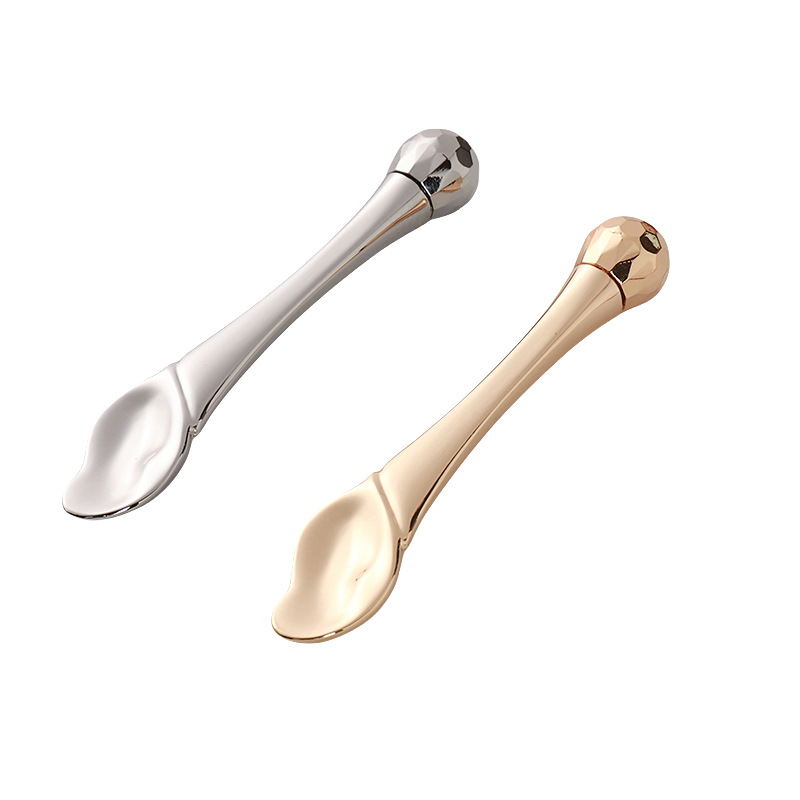 Očný valček na masážnu tyčinku Aplikátor na očný krém Kozmetické špachtle Lyžica na tvár proti vráskam Nástroj na starostlivosť o tvár zo zliatiny zlata Očný valček na masážnu tyčinku Aplikátor na očný krém Kozmetické špachtle Lyžica na tvár proti vráskam Nástroj na starostlivosť o tvár zo zliatiny zlata