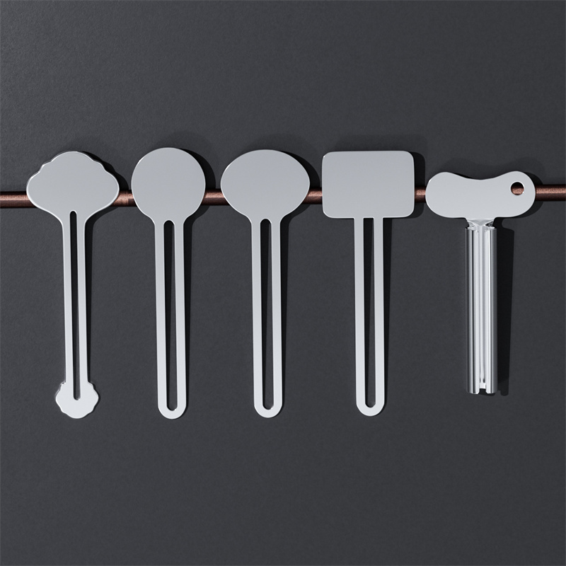 Kovový stláčač na zubnú pastu Nerezový stláčací valček na rúrky Krémy na vytláčanie farieb Nástroj na vytláčanie farieb pre rodinnú toaletu a kúpeľňu Kovový stláčač na zubnú pastu Nerezový stláčací valček na rúrky Krémy na vytláčanie farieb Nástroj na vytláčanie farieb pre rodinnú toaletu a kúpeľňu